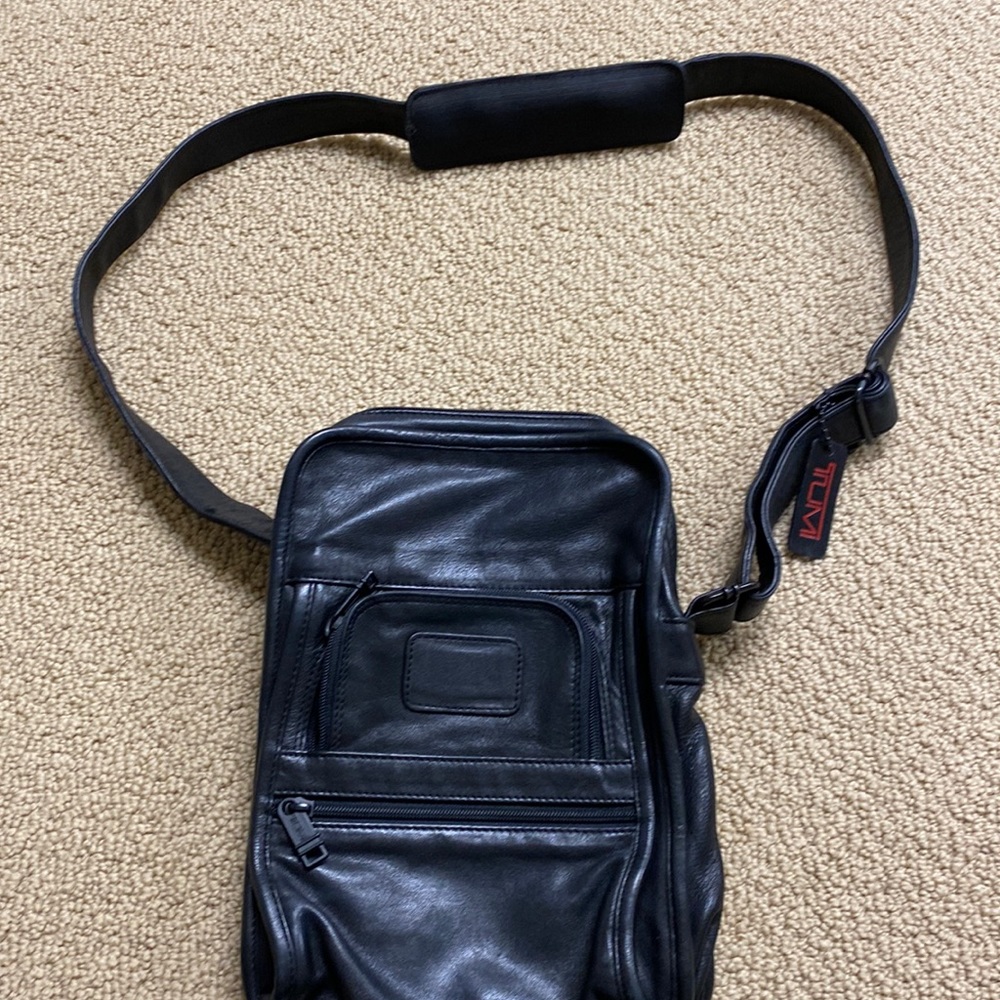 TUMI Black leather crossbody bag
